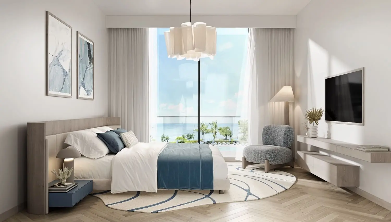 Elegant beachfront bedroom with floor-to-ceiling glazing overlooking the Arabian Gulf.