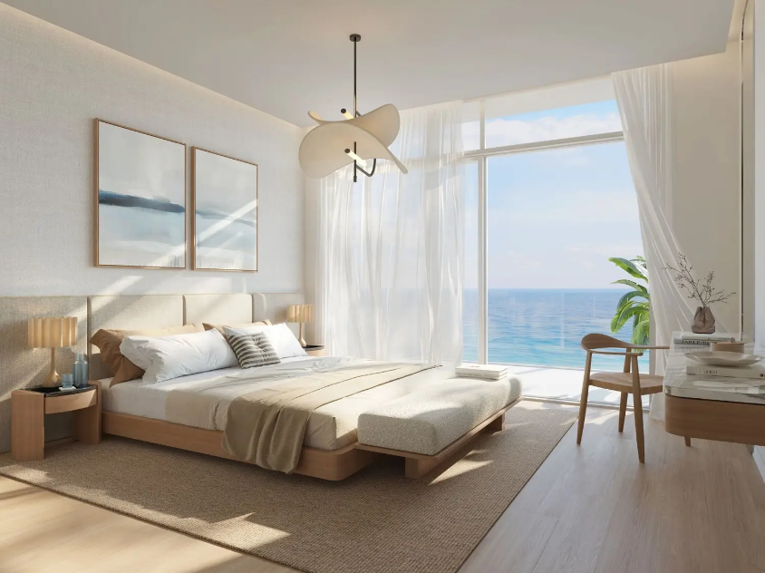 Waterfront bedroom with panoramic sea views and natural light at Fahid Beach Terraces.