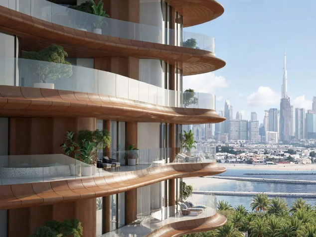 Private waterfront terrace overlooking the Arabian Gulf and Dubai skyline at Jumeirah Asora Bay.