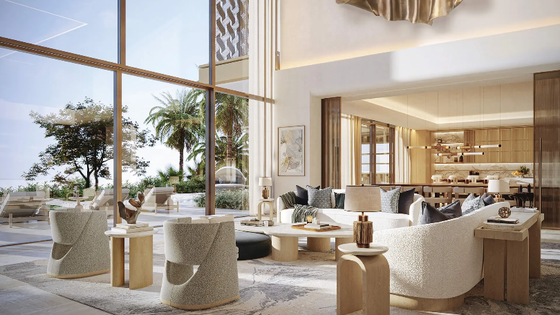 Open-plan waterfront living room and kitchen with panoramic sea views at Four Seasons Residences.