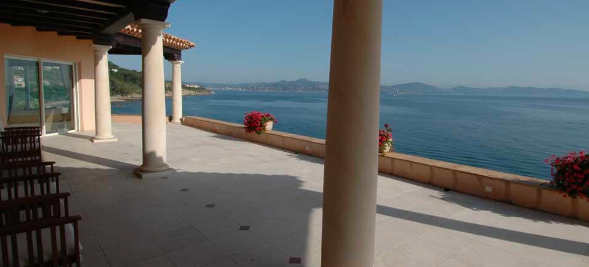 Private waterfront balcony overlooking the Mediterranean within Le Parc de Saint-Tropez.