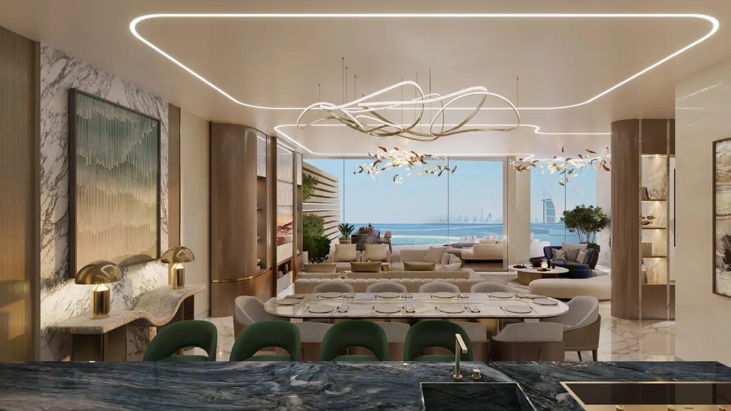 Designer kitchen and dining space connected to an open-plan waterfront living area