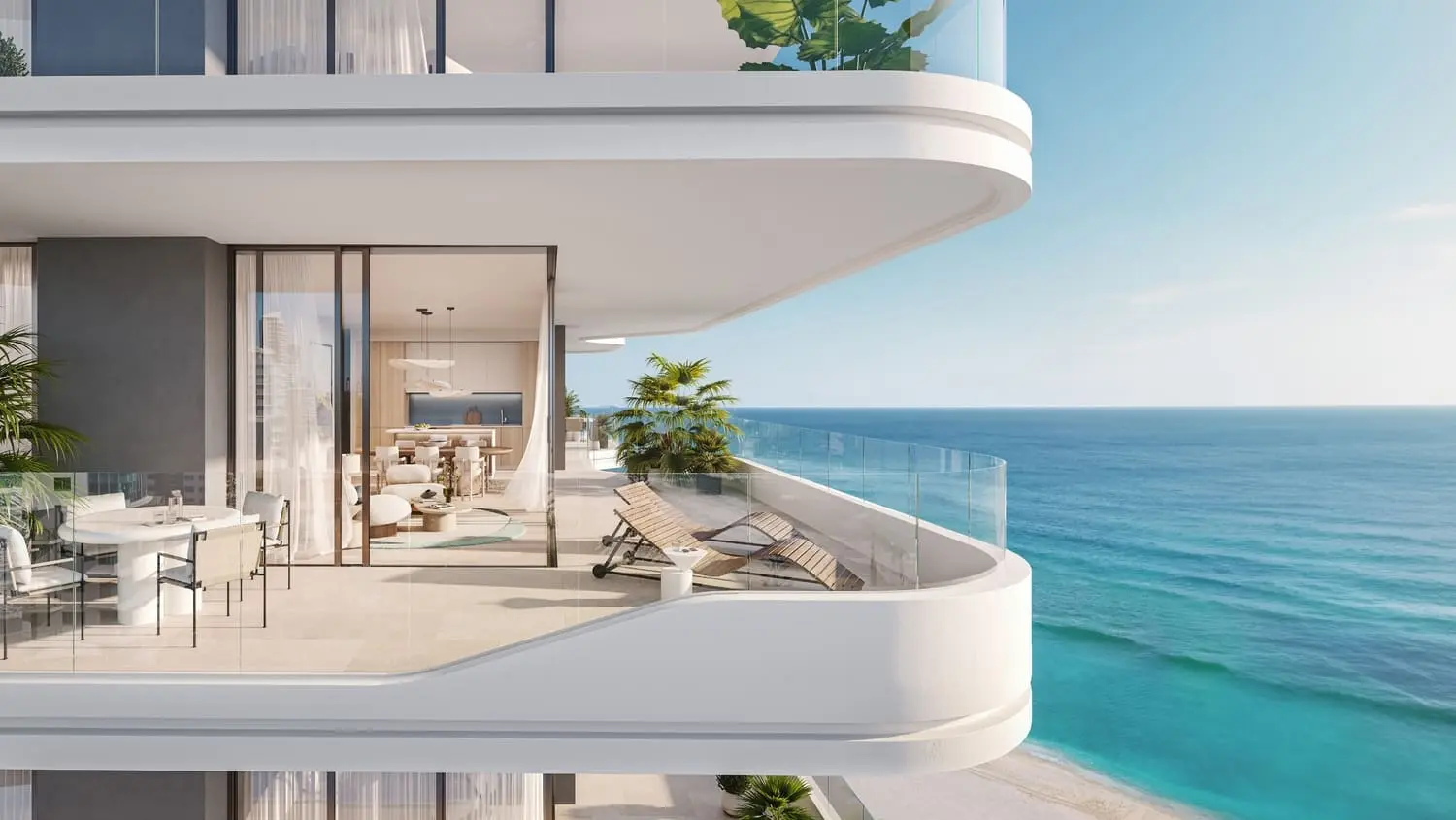 Private beachfront terrace overlooking the Arabian Gulf at Nikki Beach Residences.