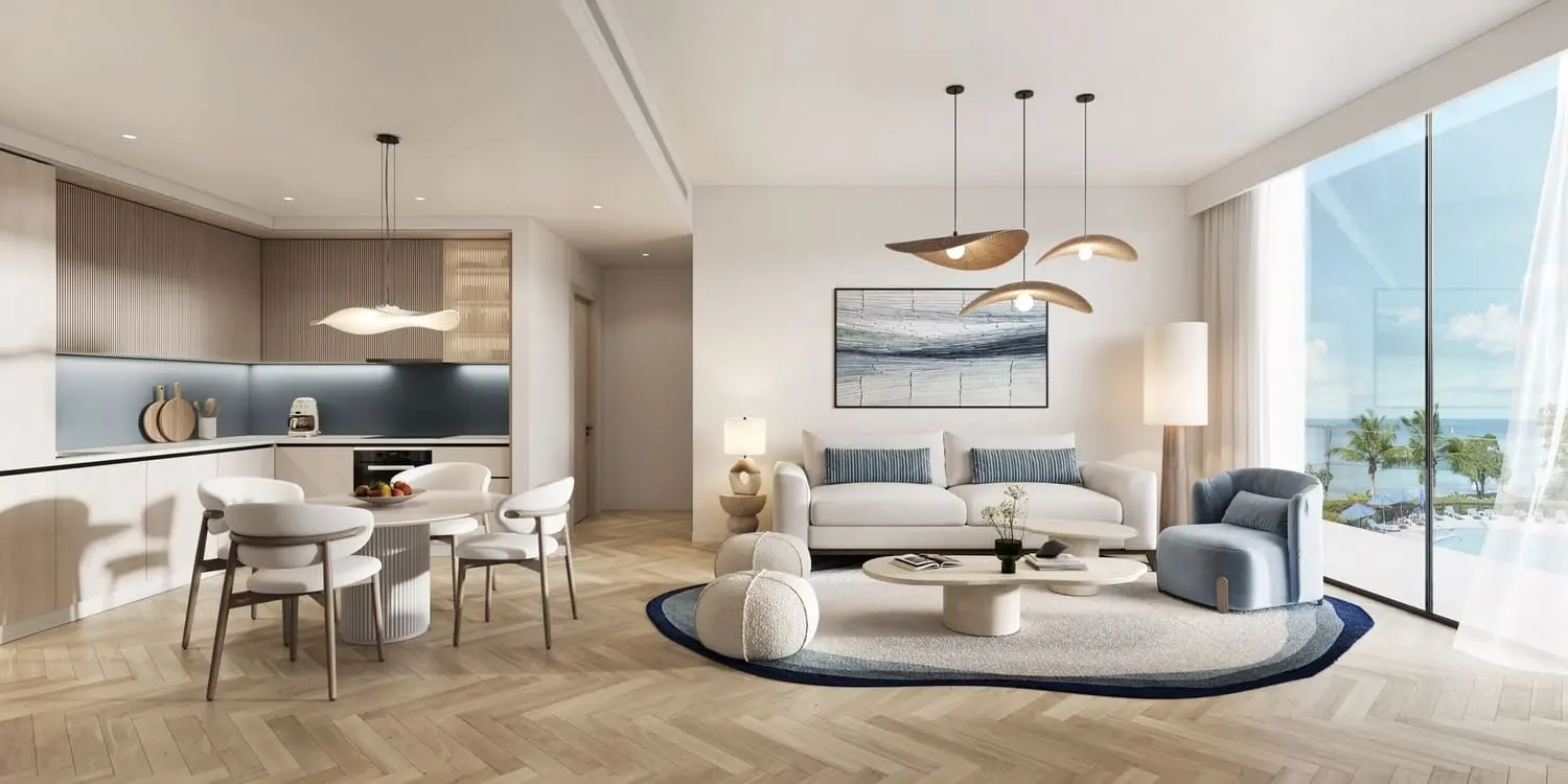 Open-plan luxury living room with panoramic sea views and contemporary coastal interiors.