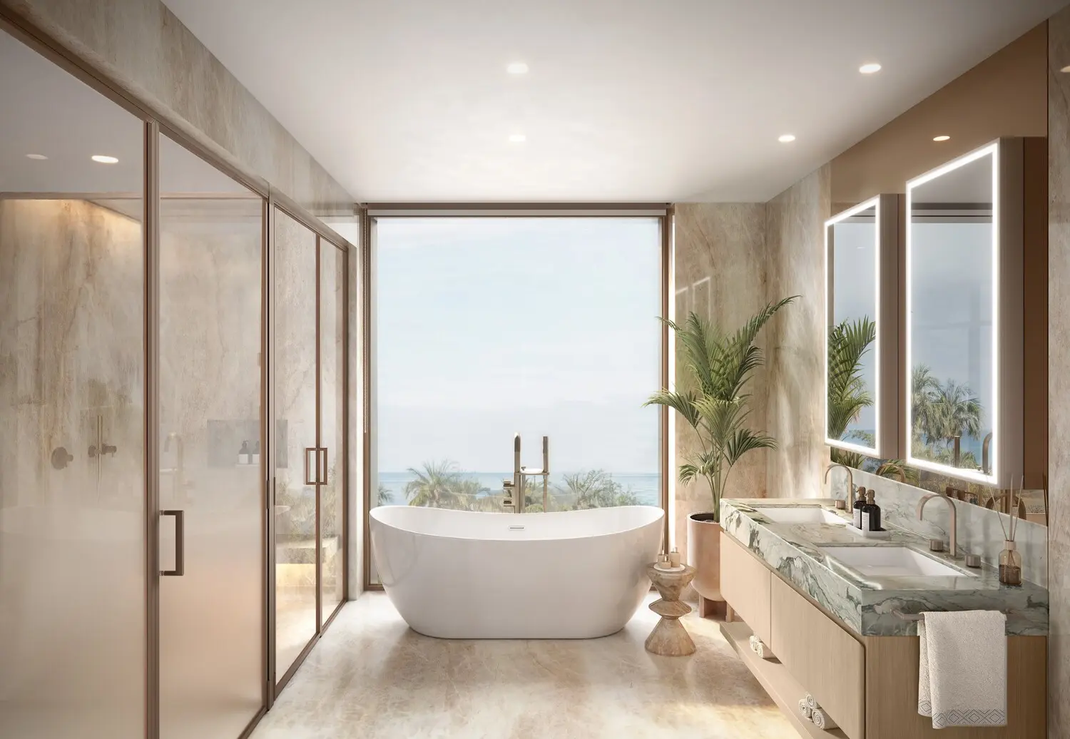 Spa-inspired marble bathroom with freestanding bathtub and sea-facing views.