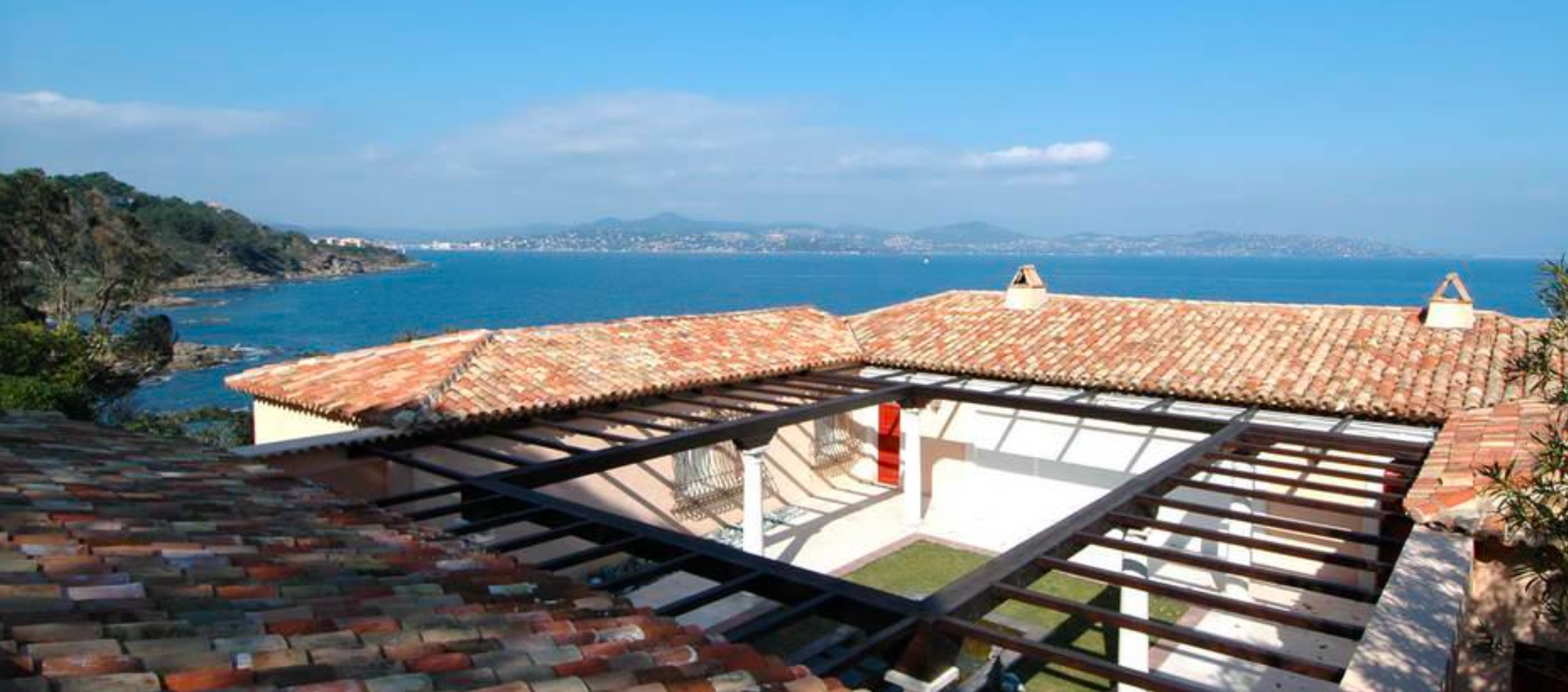 Rooftop terrace with panoramic Mediterranean water views at Villa Marine in Saint-Tropez.