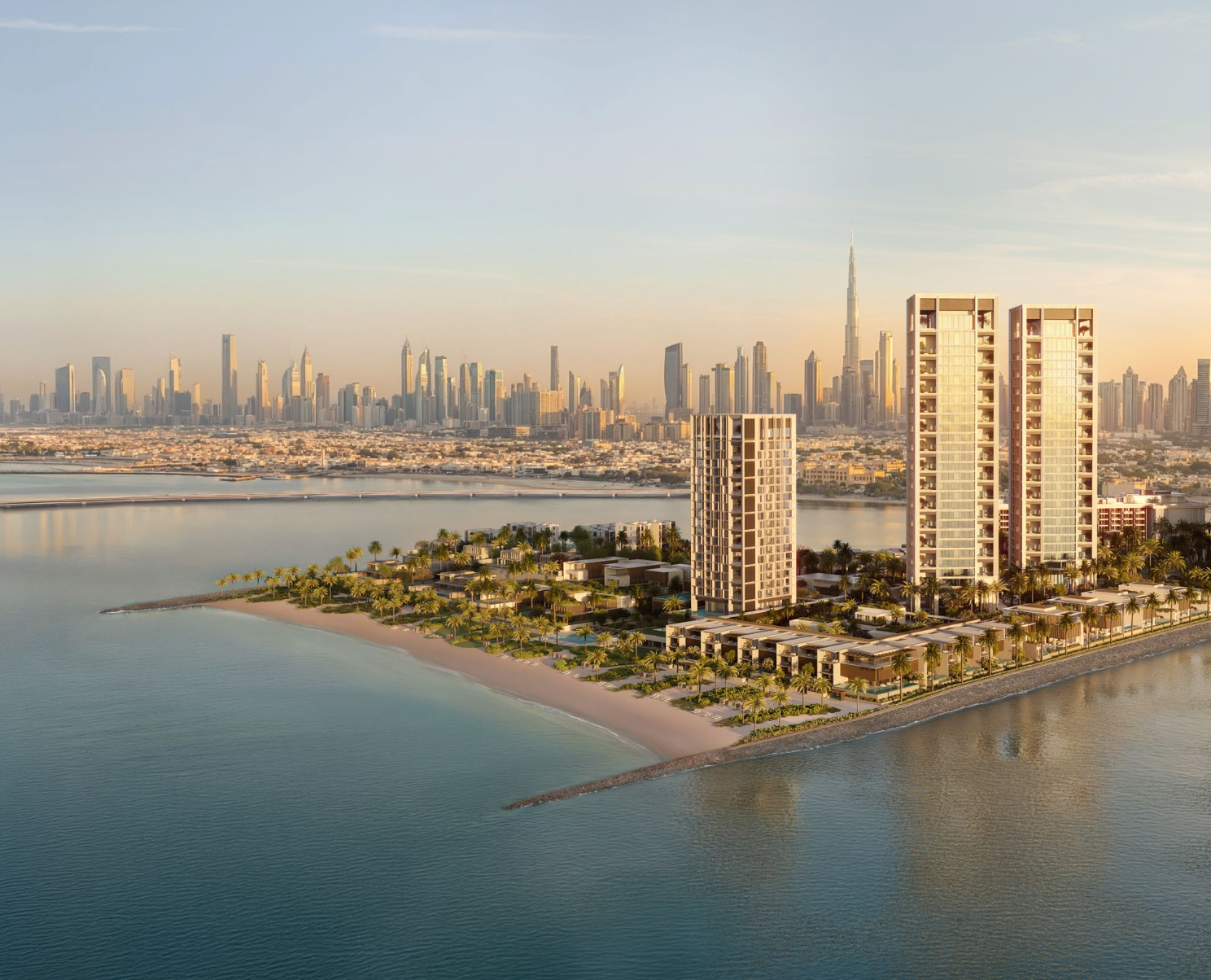 Aman Residences Dubai overlooking the waterfront and Dubai skyline at sunset.