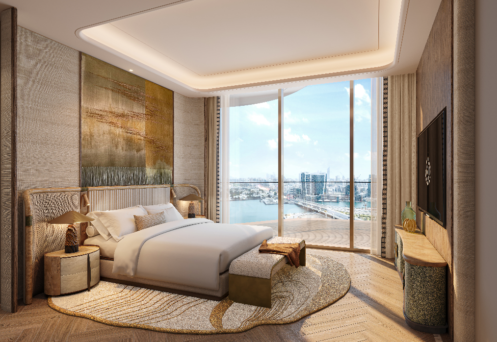 Luxury waterfront bedroom overlooking the marina and Abu Dhabi skyline at Jumeirah Residencies.