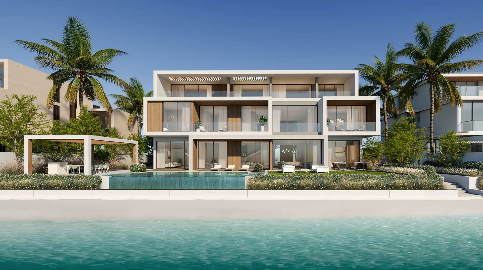 Contemporary beachfront Palm Jebel Ali villa surrounded by tropical landscaping and private waterfront living.