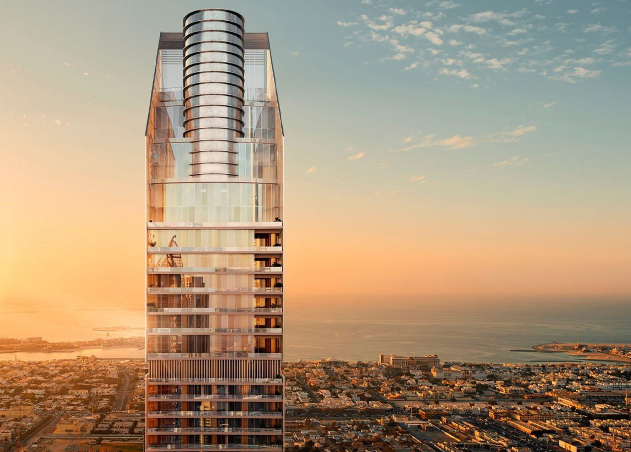 The exterior tower skyline shot with the golden façade and Downtown skyline backdrop